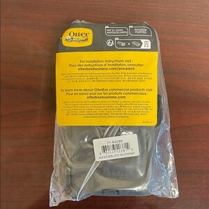 OtterBox Black Phone Case with Yellow Packaging Label